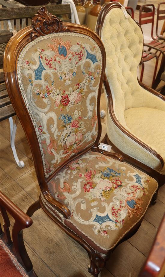 A Victorian walnut spoon back nursing chair with tapestry upholstery